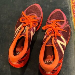 New Balance Revlit purple orange tennis shoes